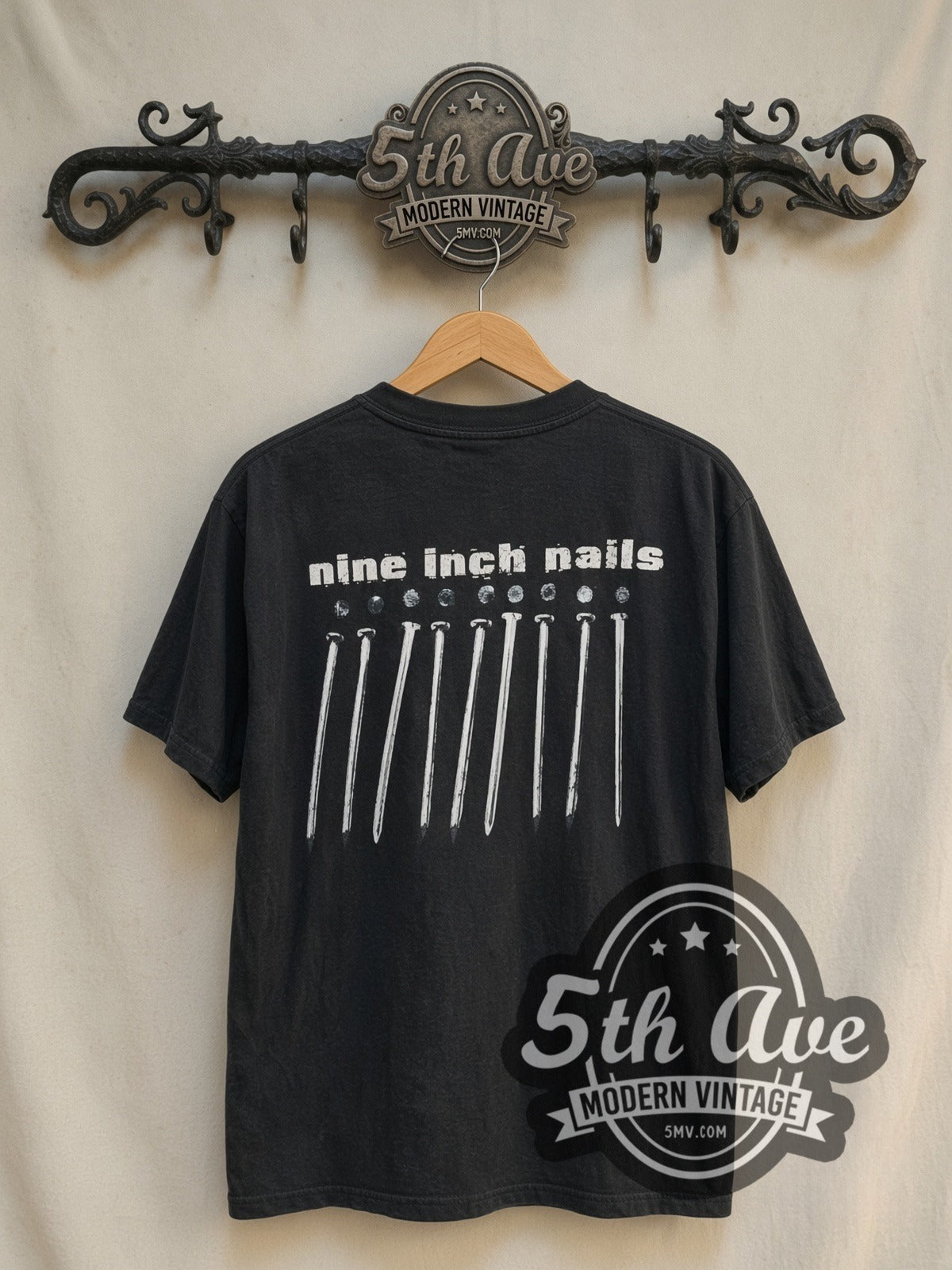 Nine Inch Nails NIИ 'With Teeth vintage band t-shirt in black, back view on a display rack