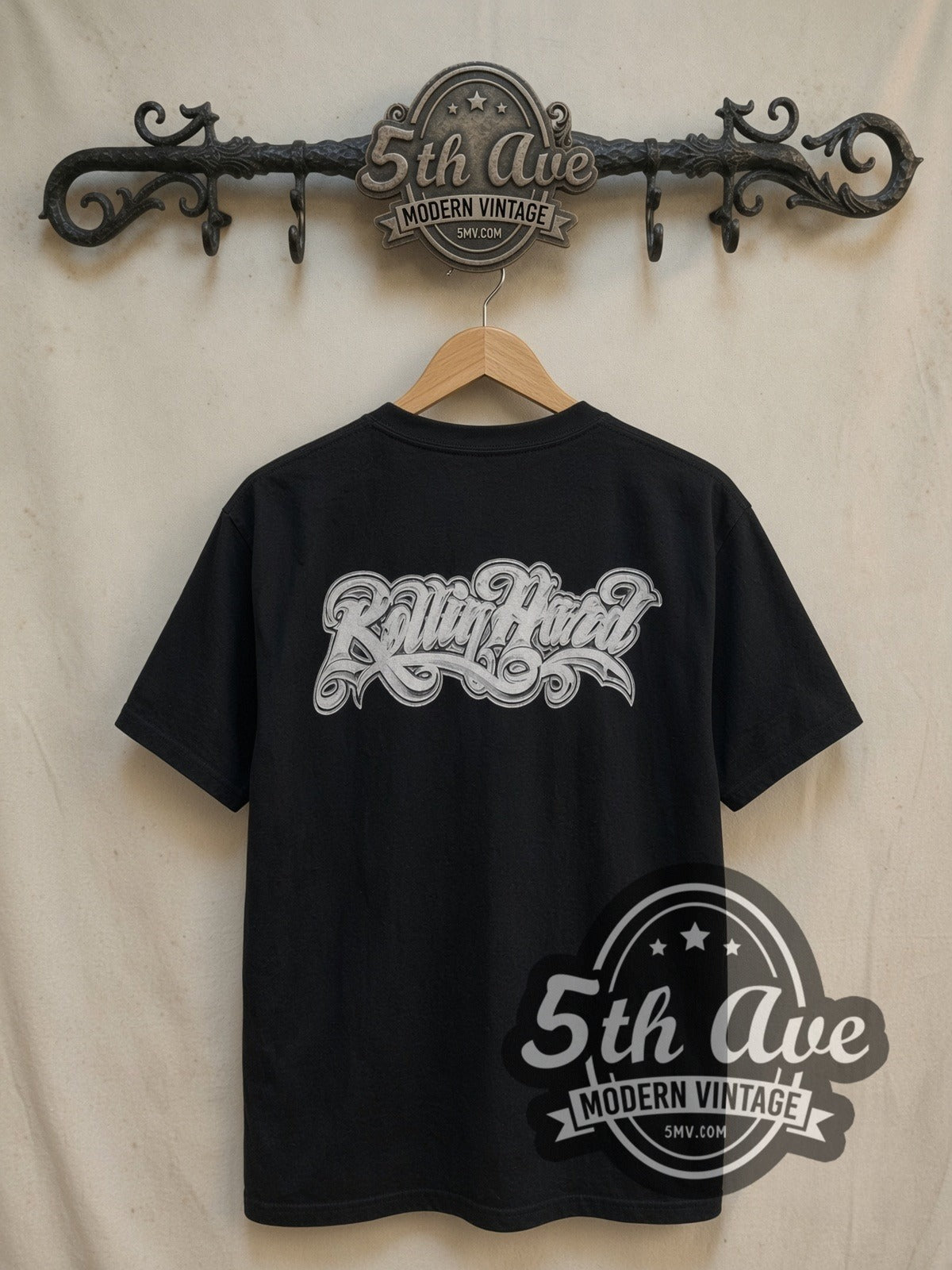 Rollin Hard Freaky Behavior Lowrider vintage graphic tee, back view on a display rack
