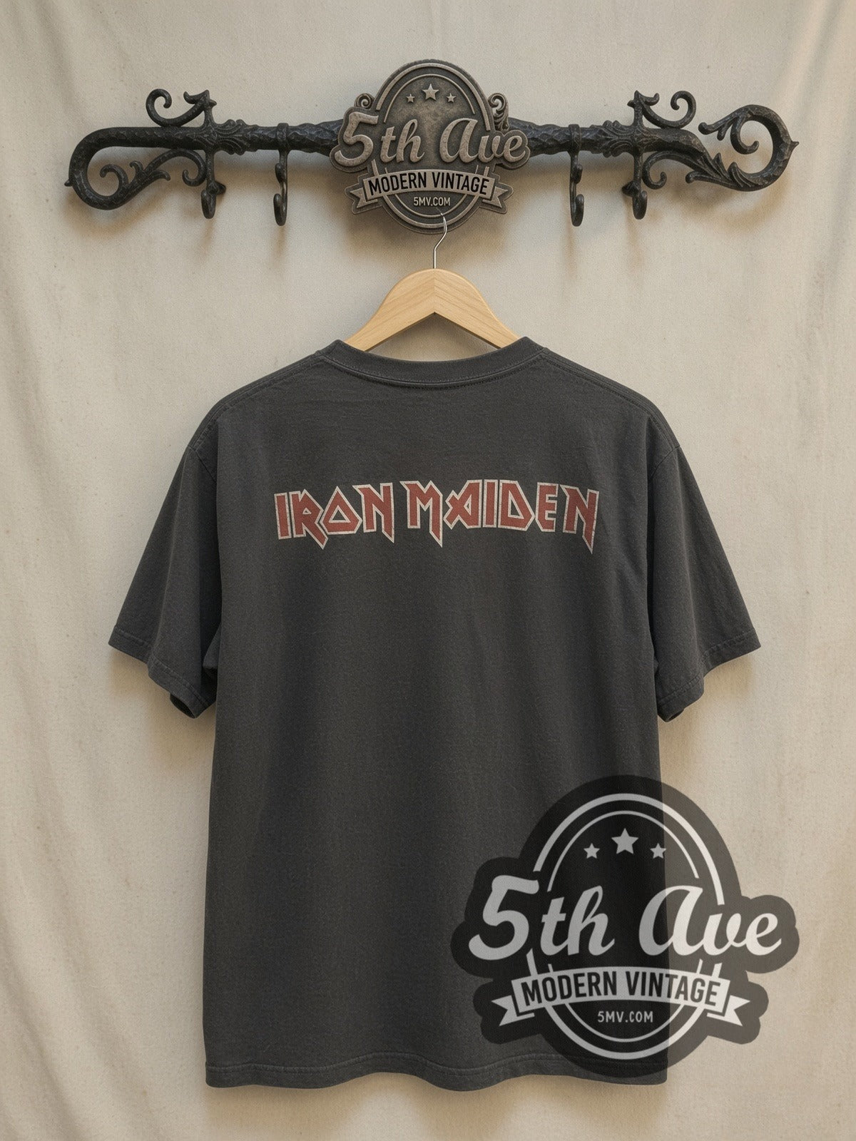 Iron Maiden Killers Circular Eddie Hatchet vintage band t-shirt, back view on a display rack