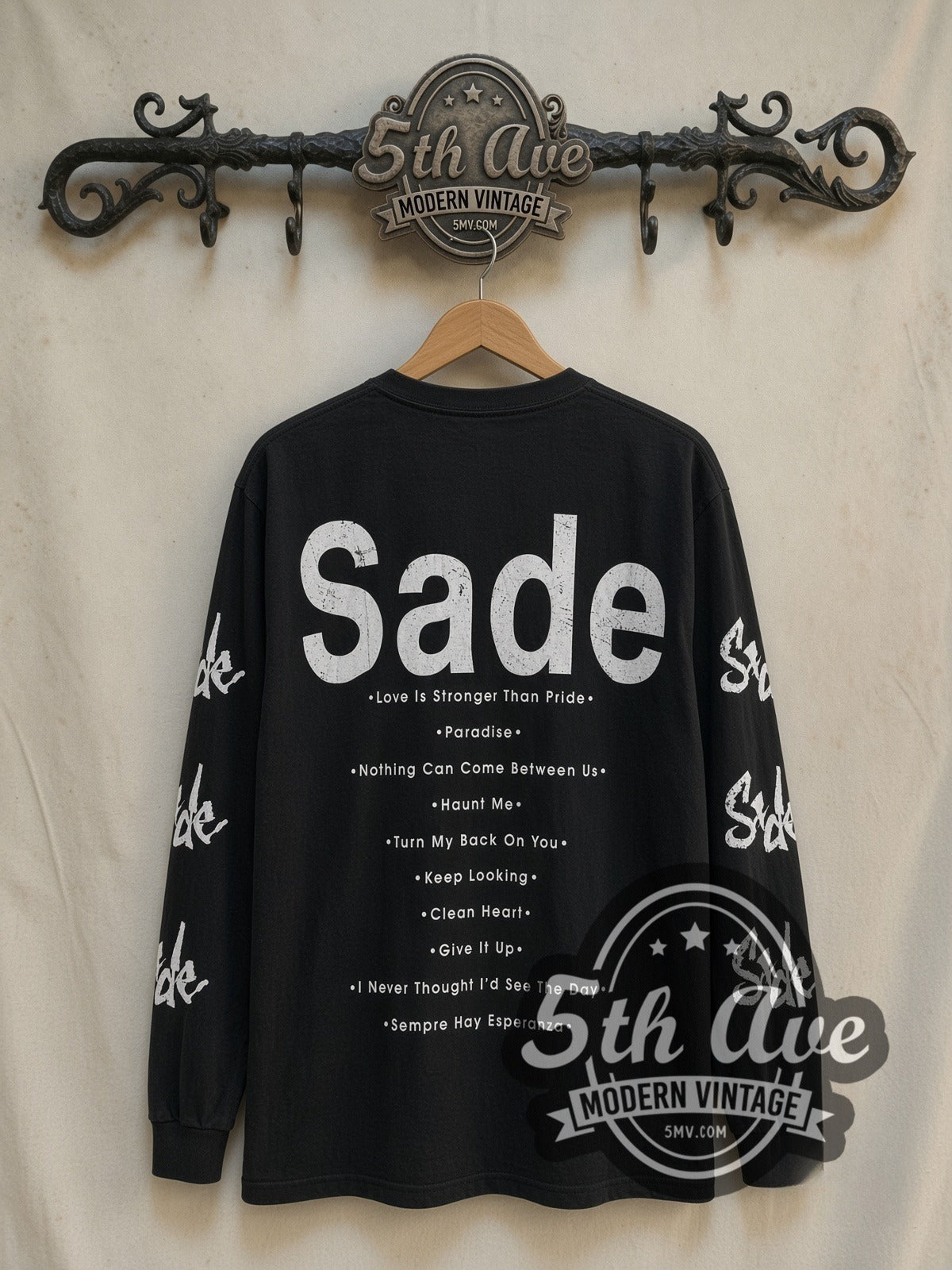 Sade Love Is Stronger Than Pride Long Sleeve vintage band t-shirt in white, back view on a display rack