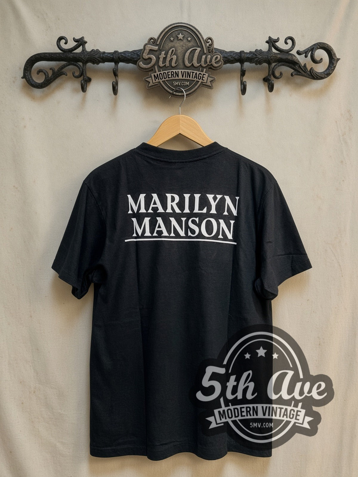 Marilyn Manson Clown Makeup Portrait vintage band t-shirt, back view on a display rack