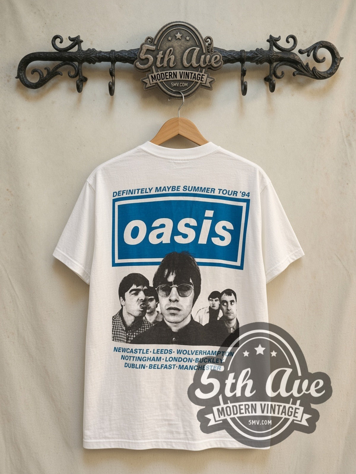 Oasis Definitely Maybe Summer Tour 1994 vintage band t-shirt in white, back view on a display rack