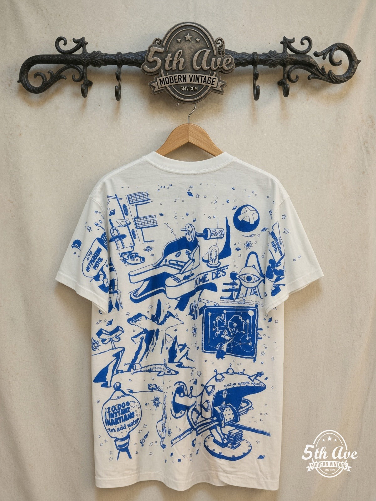 Looney Tunes – Marvin the Martian Loonatic Streetwear – All Over Print – New Vintage Graphic Tee — back on locked cream ornate 5th Ave rack