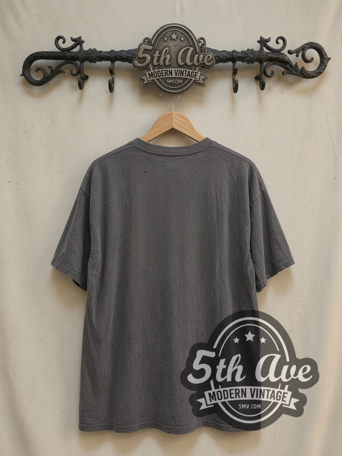 Thom Yorke all-over-print vintage band t-shirt, back view on a display rack