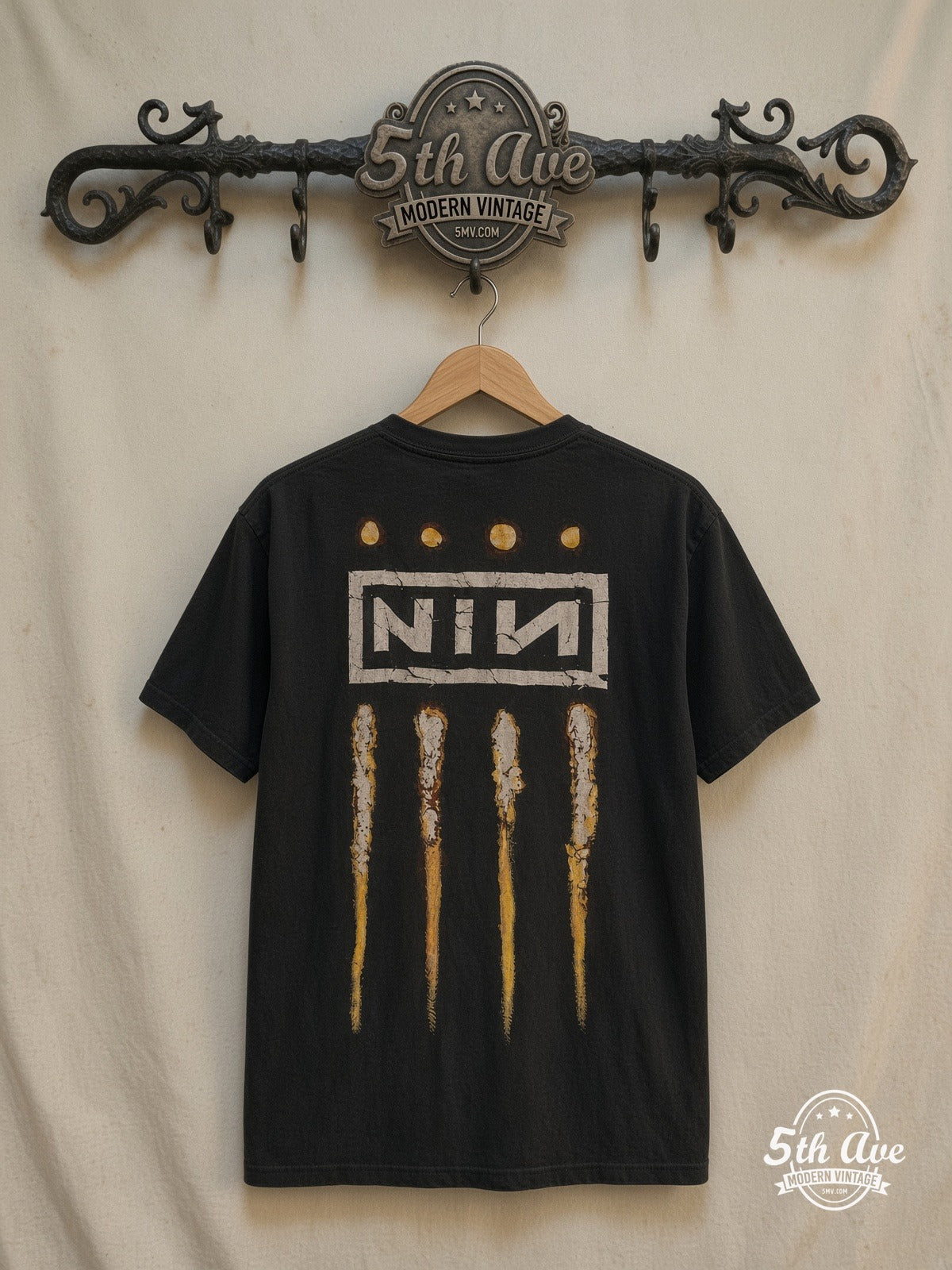 Nine Inch Nails – The Downward Spiral – Vintage Band T-Shirt — back on locked cream ornate 5th Ave rack