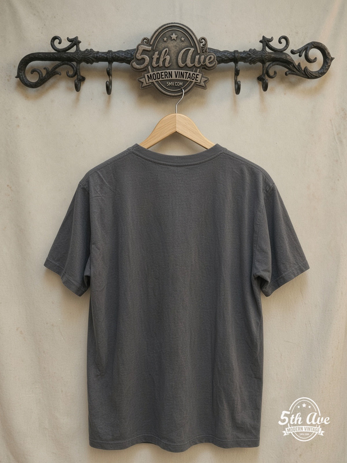 Venom – Vintage Band T-Shirt — back on locked cream ornate 5th Ave rack