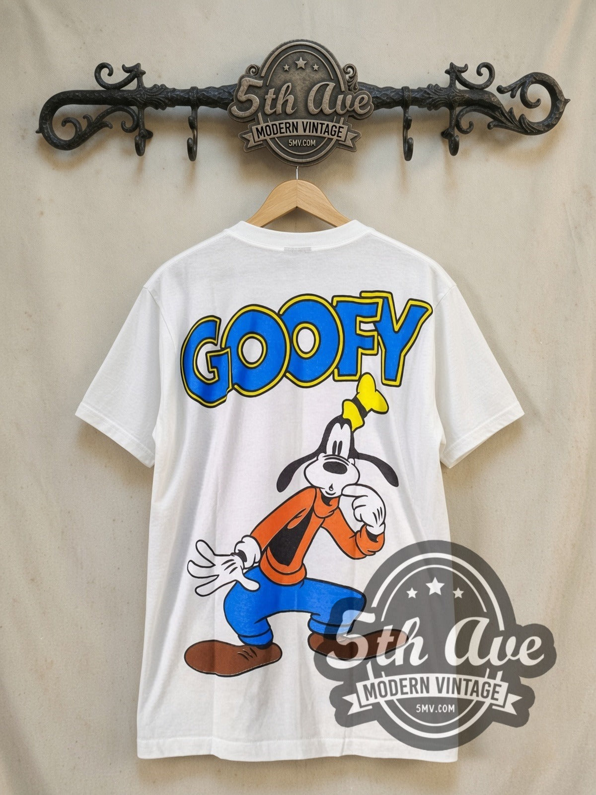 Disney Goofy graphic tee, back view on a display rack