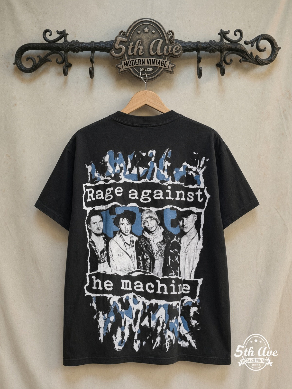 Rage Against the Machine – Bombtrack Blue Soldier – All Over Print – Vintage Band T-Shirt — back on locked cream ornate 5th Ave rack