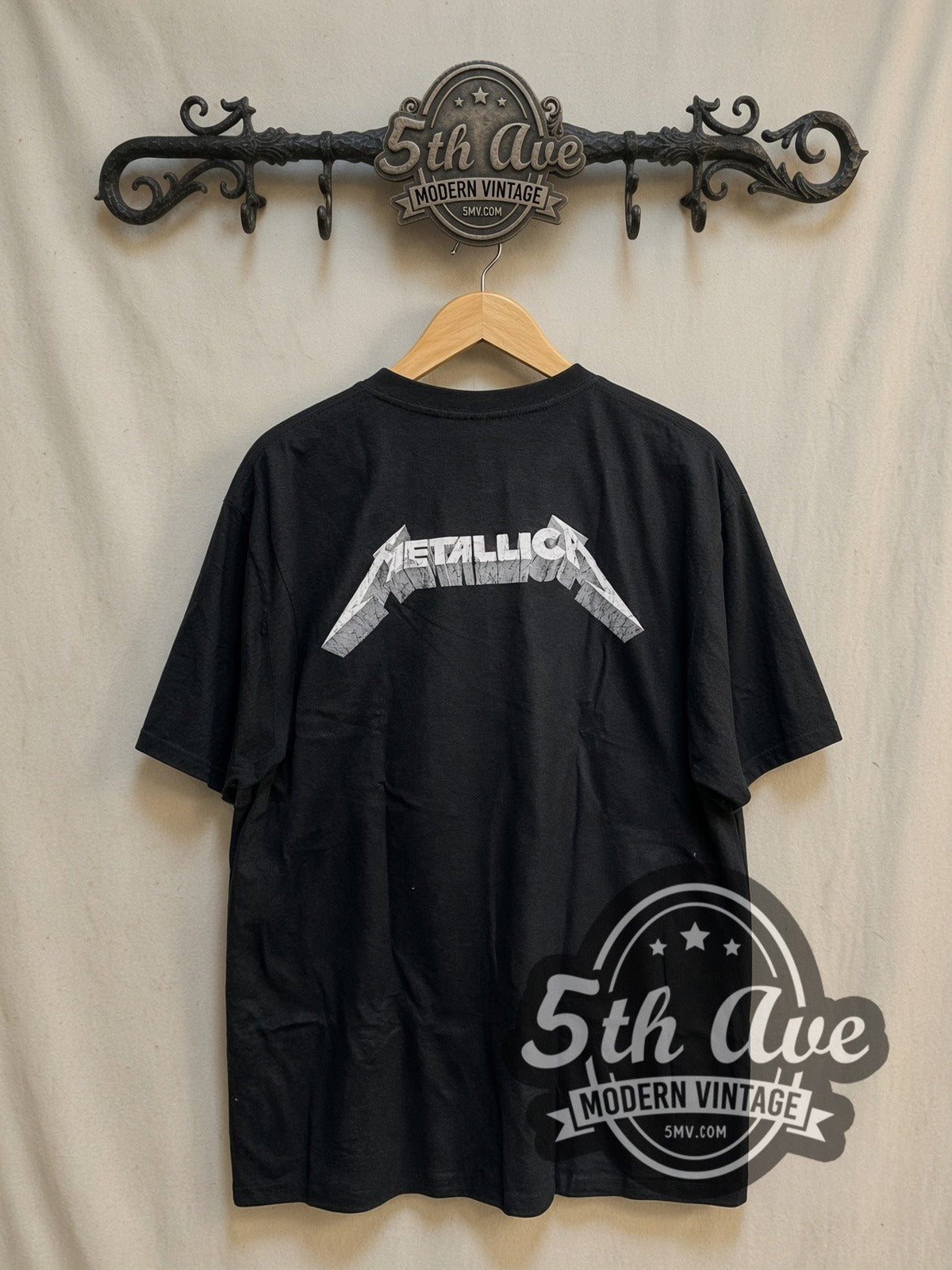 Metallica St. Anger vintage band t-shirt, back view on a display rack