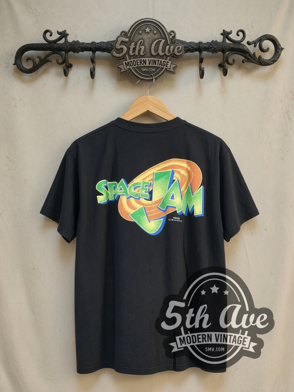 Looney Tunes Space Jam Bugs Bunny and Daffy Duck all-over-print vintage cartoon tee, back view on a display rack
