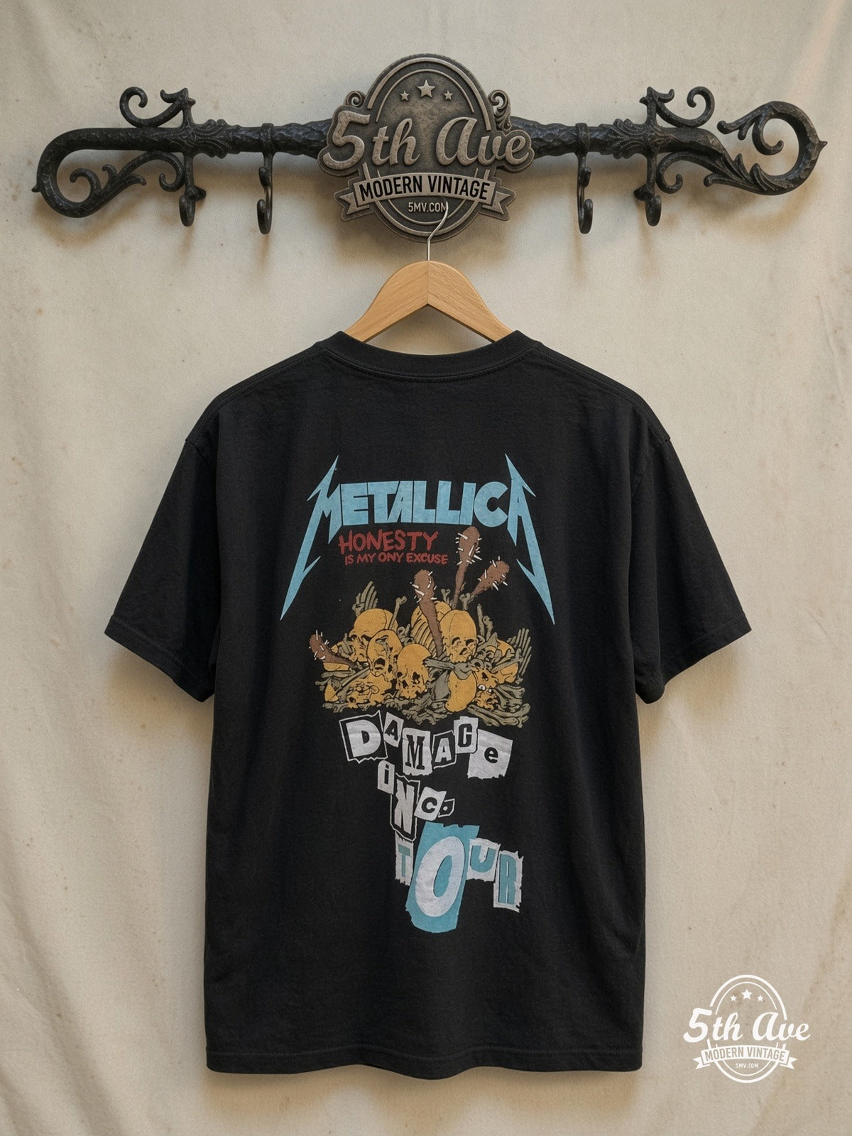 Metallica – Damage Inc. Split Red Skull – Vintage Band T-Shirt — back on locked cream ornate 5th Ave rack