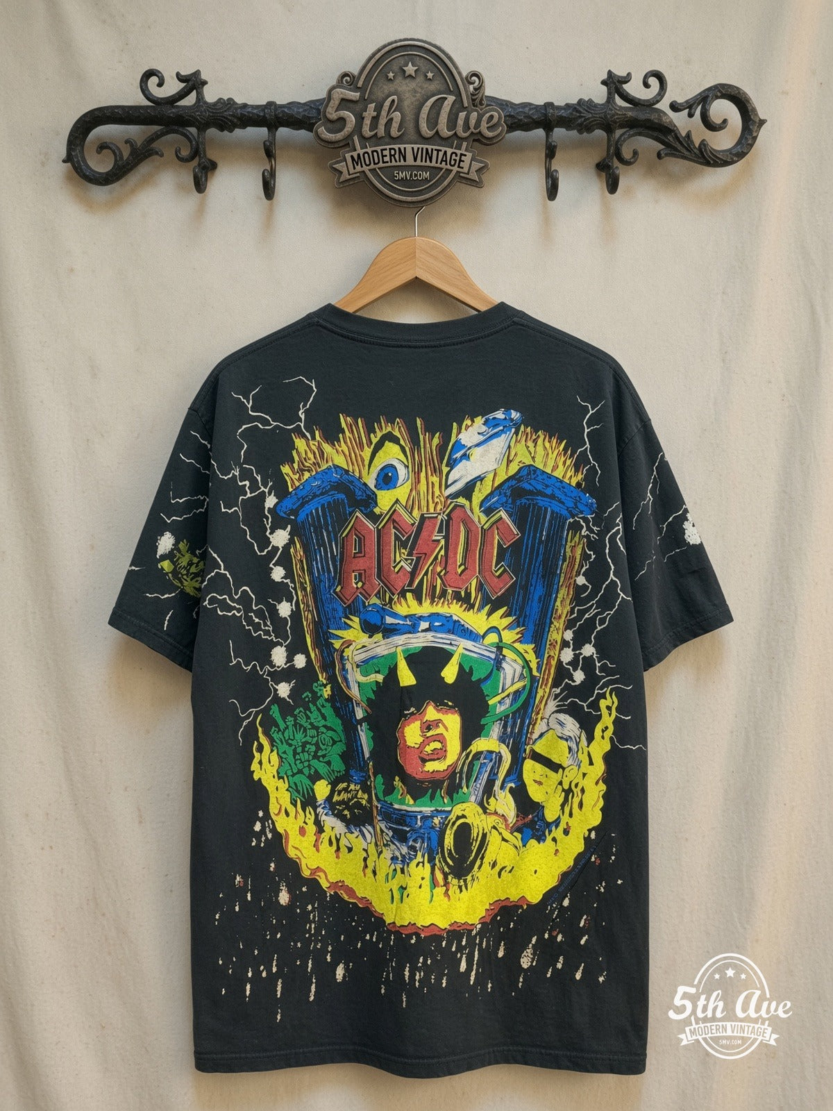 AC/DC – Angus Young Thunderstruck – All Over Print – Vintage Band T-Shirt — back on locked cream ornate 5th Ave rack