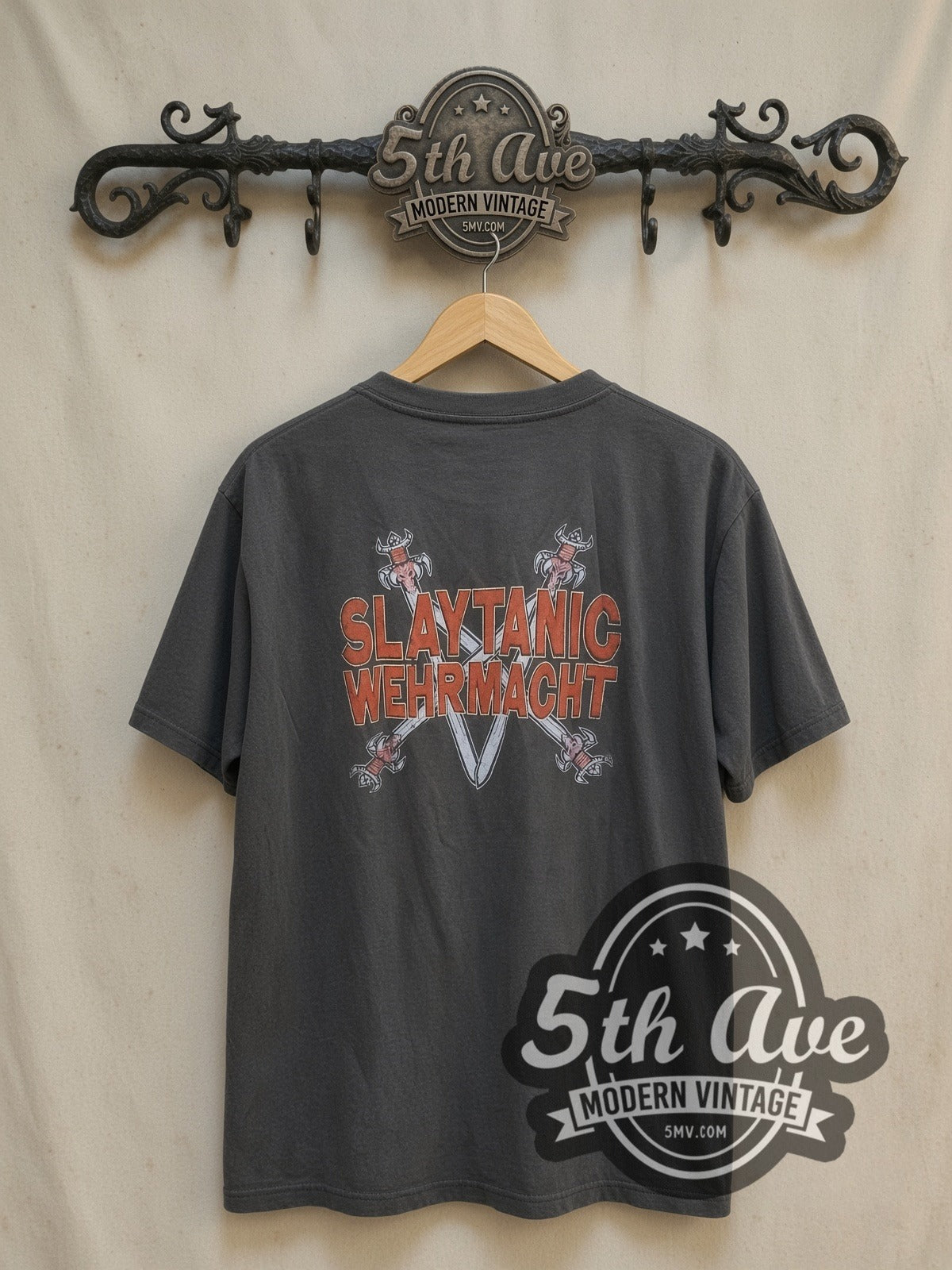 Slayer Slaytanic Wehrmacht Helmet Skull vintage band t-shirt, back view on a display rack