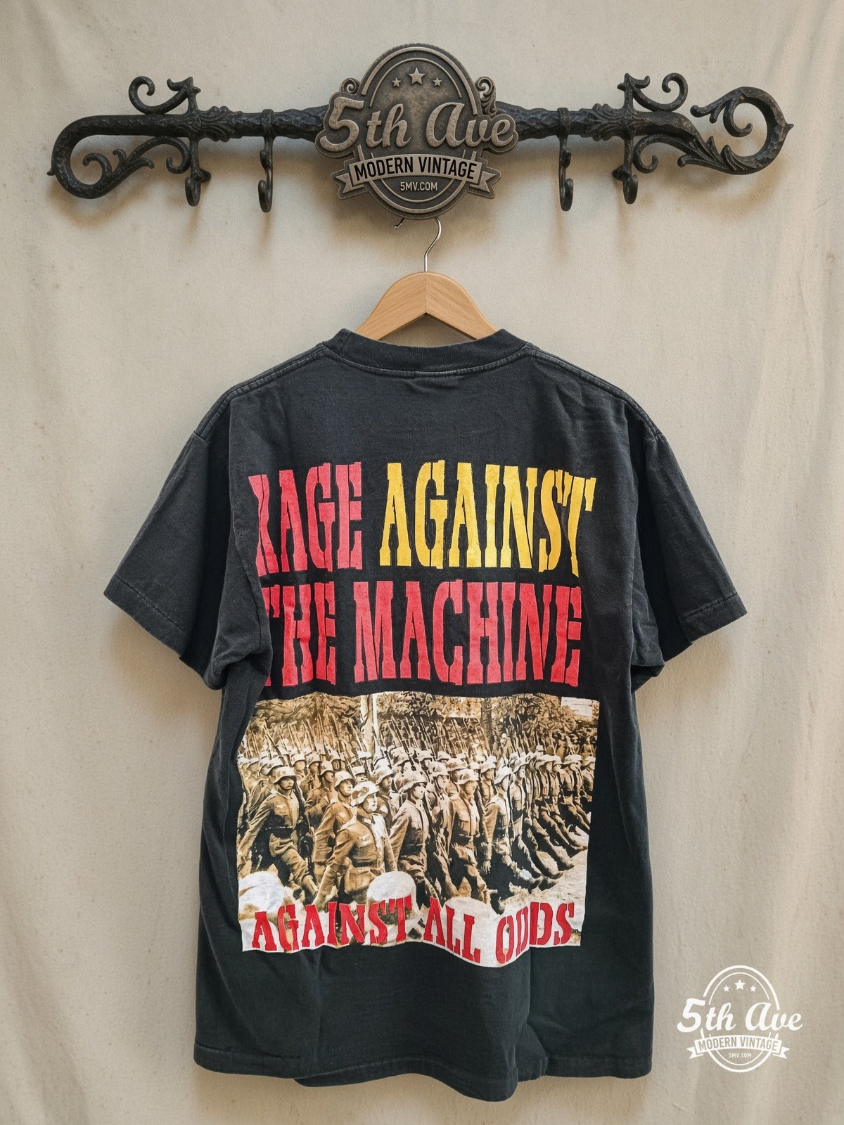 Rage Against the Machine – Against All Odds – Vintage Band T-Shirt — back on locked cream ornate 5th Ave rack