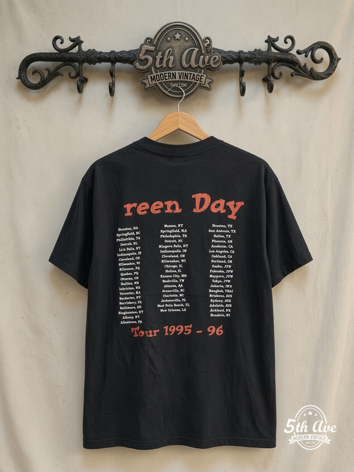 Green Day – International Superhits Tour – Vintage Band T-Shirt — back on locked cream ornate 5th Ave rack
