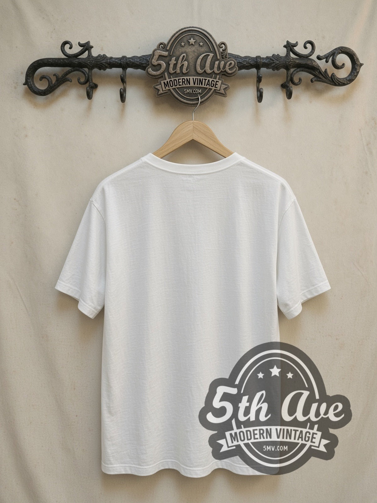 Fleetwood Mac Penguin Logo vintage band t-shirt in white, back view on a display rack
