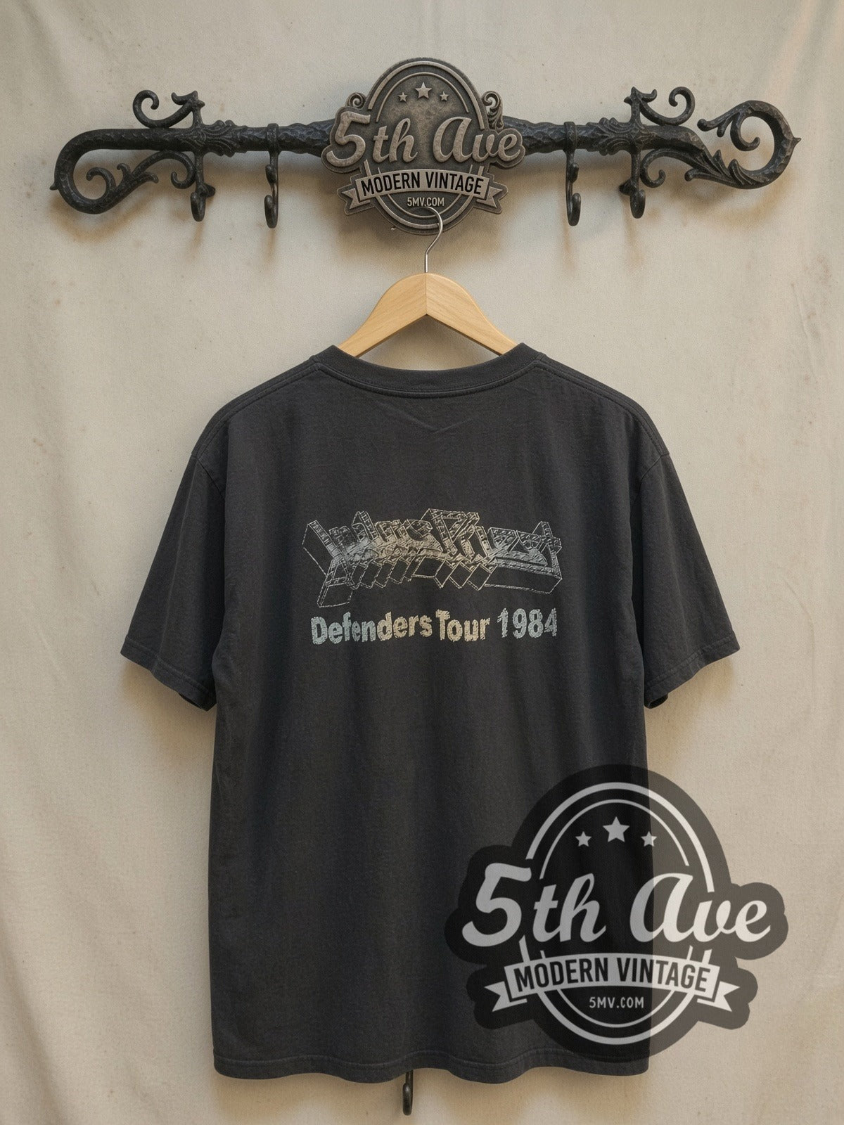Judas Priest Defenders Tour 1984 vintage band t-shirt, back view on a display rack