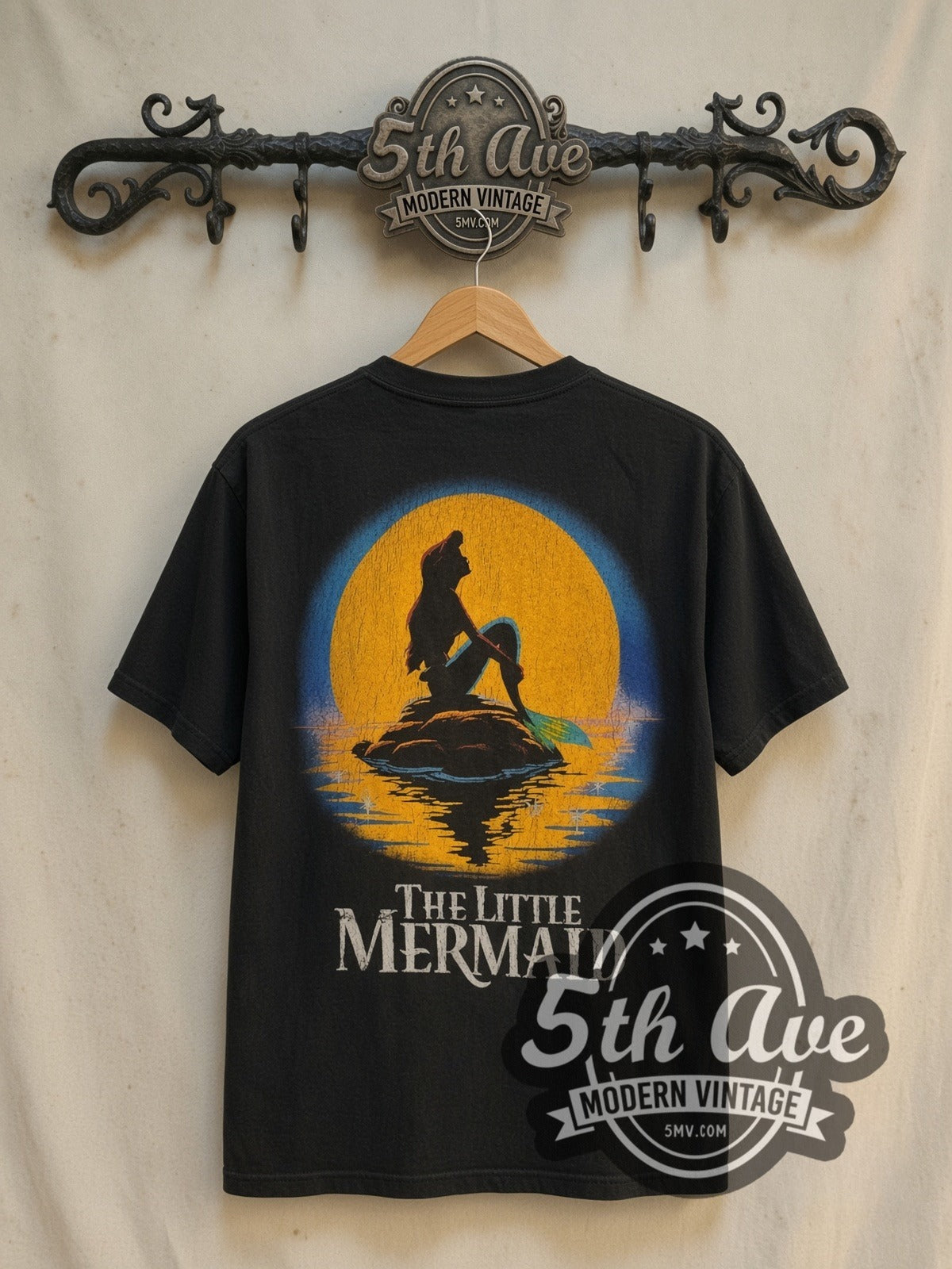 Disney The Little Mermaid Ariel and Flounder vintage cartoon tee in black, back view on a display rack