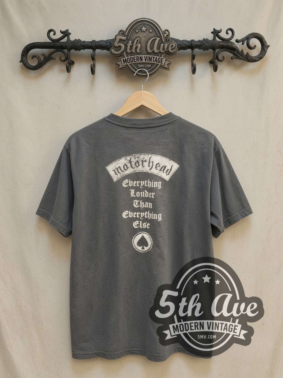Motörhead Everything Louder Than Everything Else vintage band t-shirt, back view on a display rack