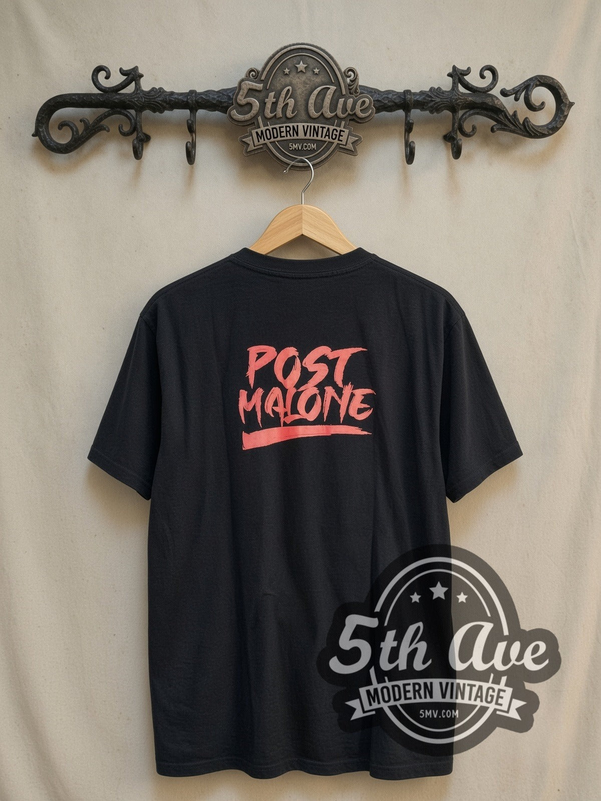 Post Malone vintage rap tee, back view on a display rack