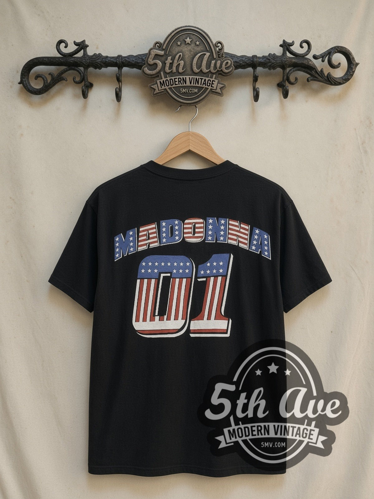 Madonna Music Album Cowboy Era vintage band t-shirt in black, back view on a display rack