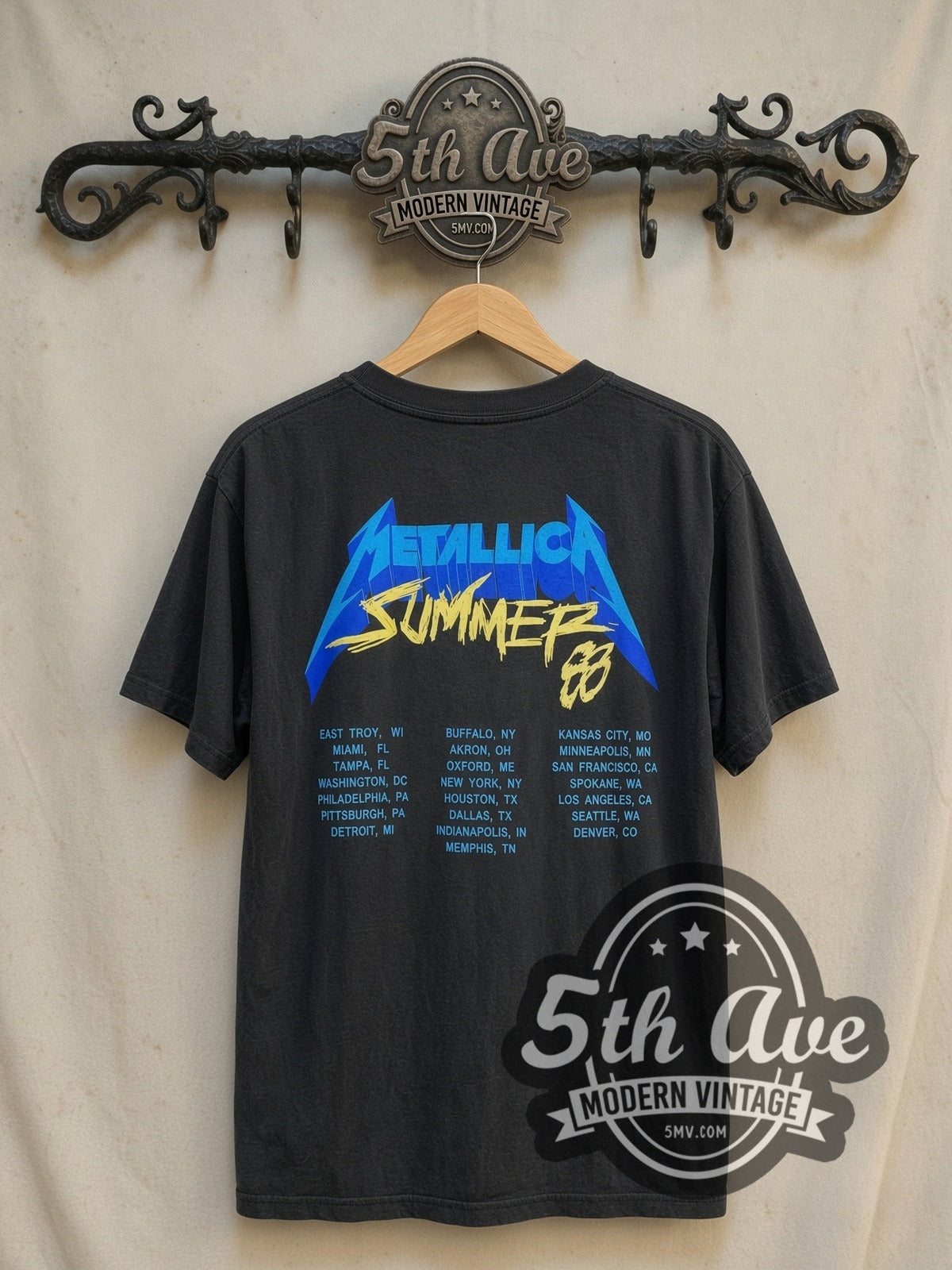 Metallica Damaged Justice Blindfold Scale vintage band t-shirt, back view on a display rack