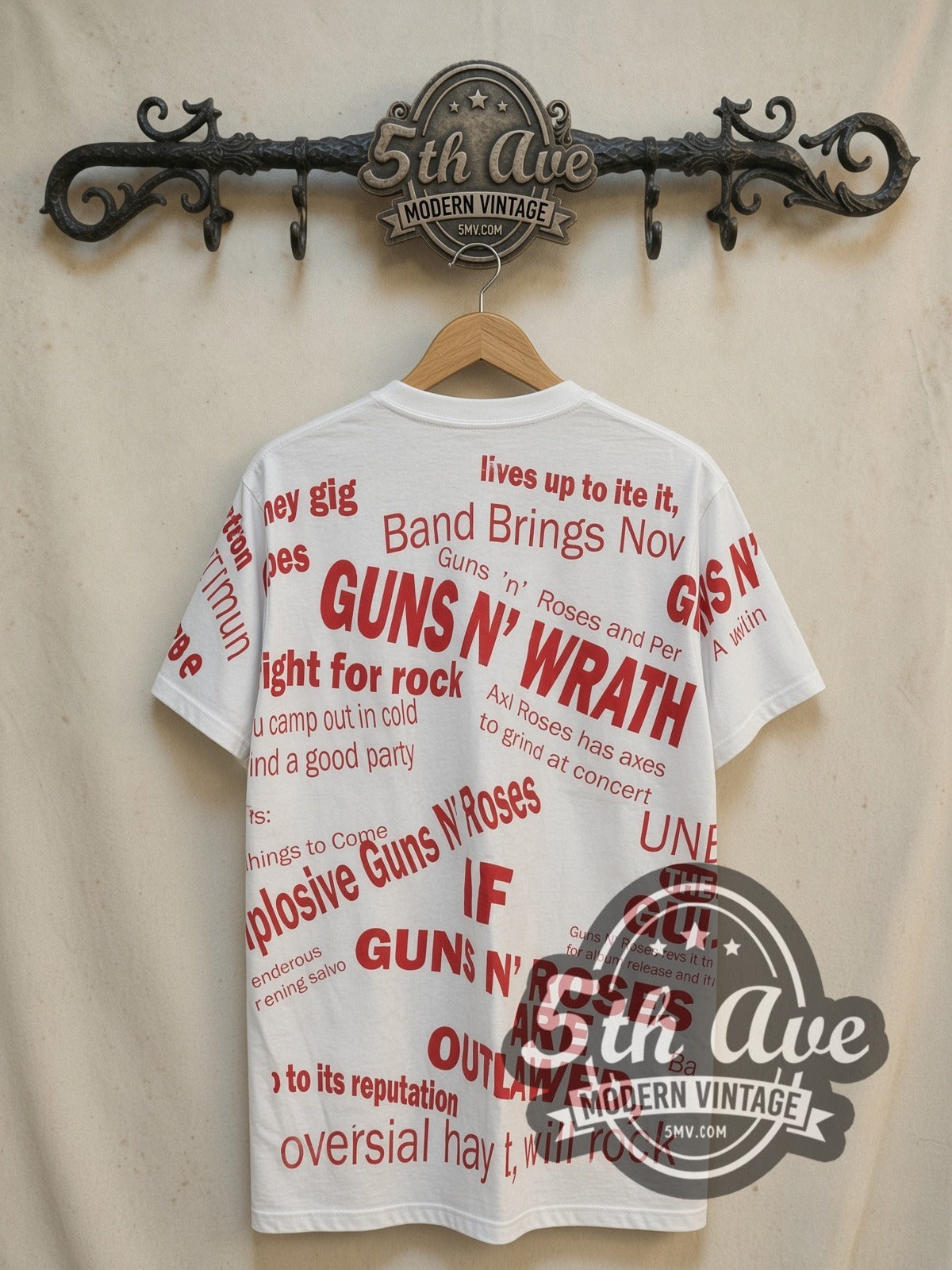 Guns N' Roses DEAD Newspaper Headlines all-over-print vintage band t-shirt in white, back view on a display rack