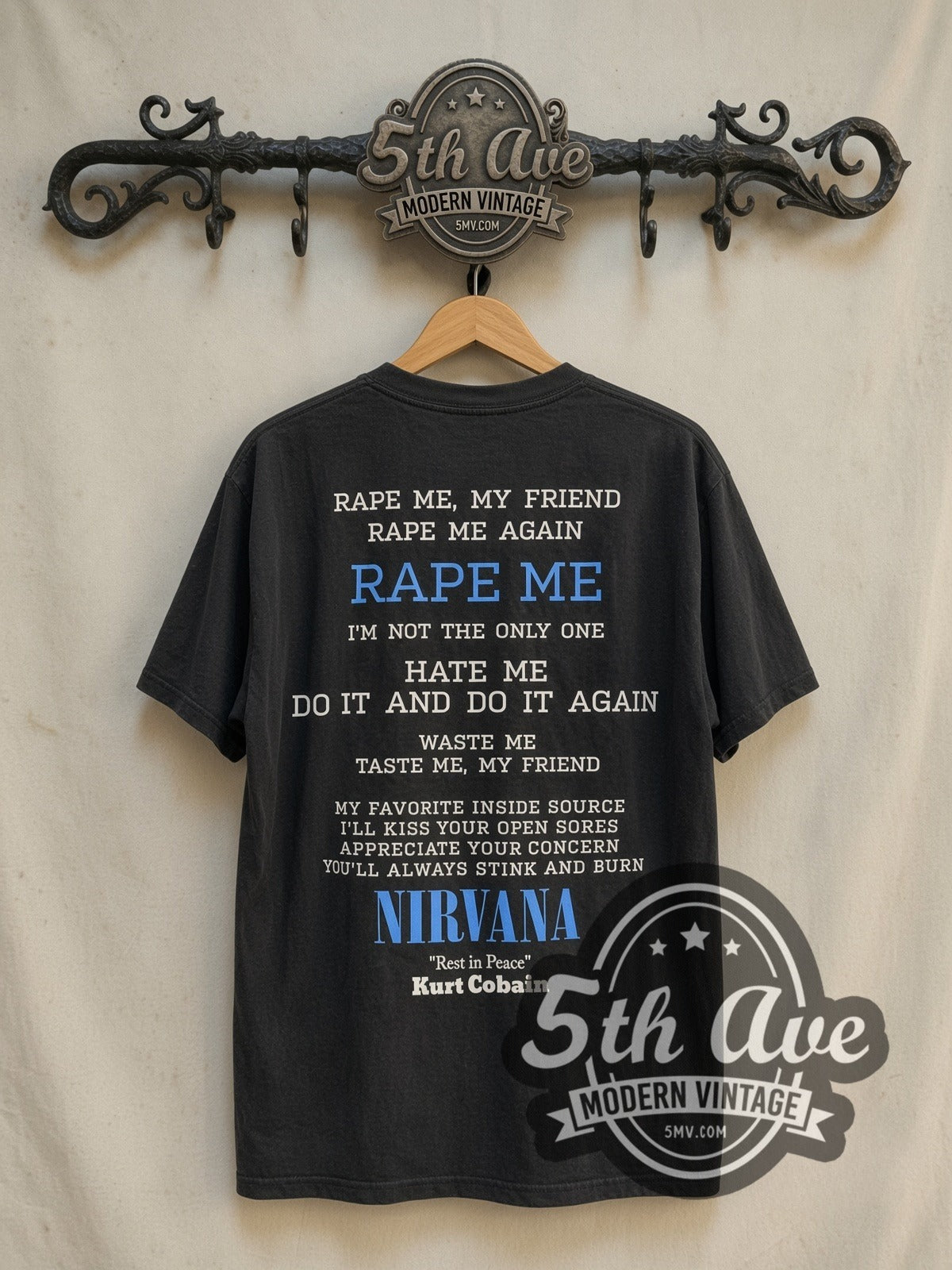 Nirvana Rape Me vintage band t-shirt in black, back view on a display rack