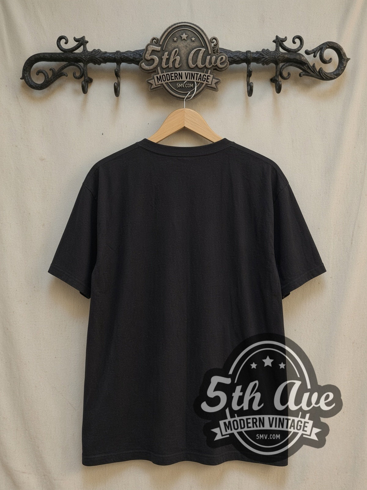 Jimi Hendrix Purple Haze vintage band t-shirt, back view on a display rack