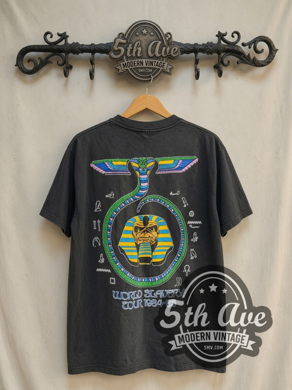 Iron Maiden World Slavery Tour' 1984/85 vintage band t-shirt in black, back view on a display rack