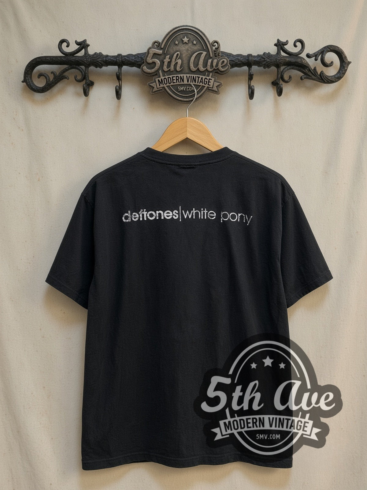 Deftones White Pony vintage band t-shirt in white, back view on a display rack