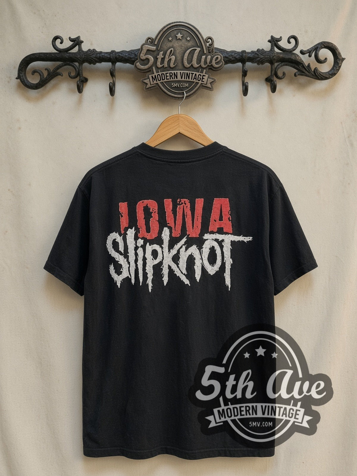 Slipknot Iowa vintage band t-shirt in black, back view on a display rack