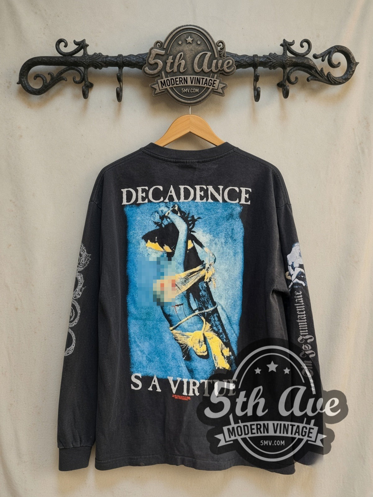 Cradle of Filth Decadence Is a Virtue vintage band long sleeve t-shirt, back view on a display rack