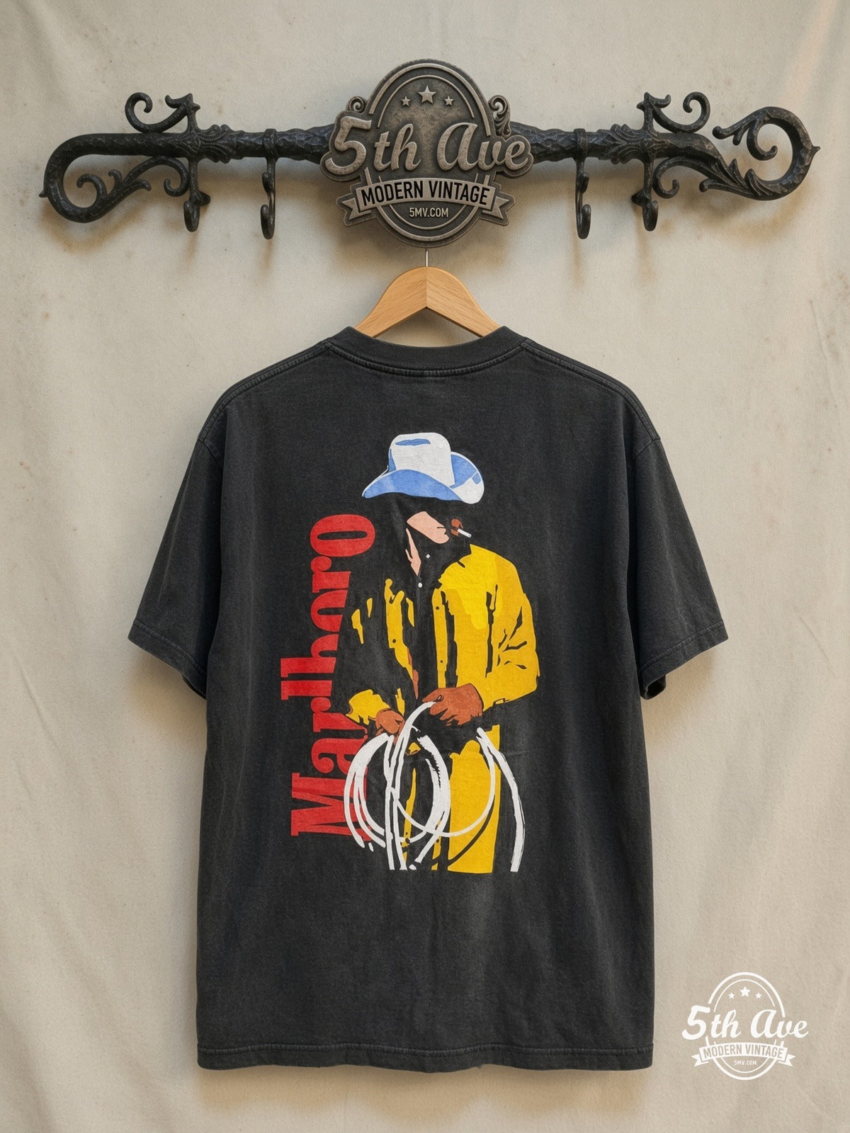 Marlboro – Cowboy – Vintage Graphic Tee — back on locked cream ornate 5th Ave rack