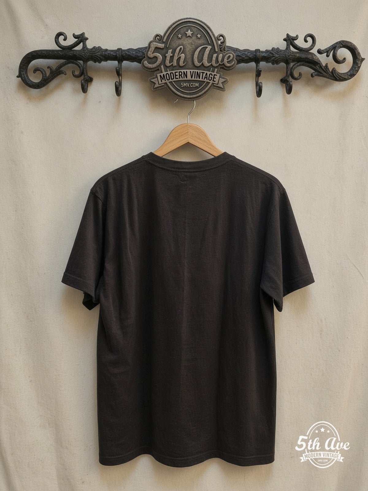 Janis Joplin – Vintage Band T-Shirt — back on locked cream ornate 5th Ave rack