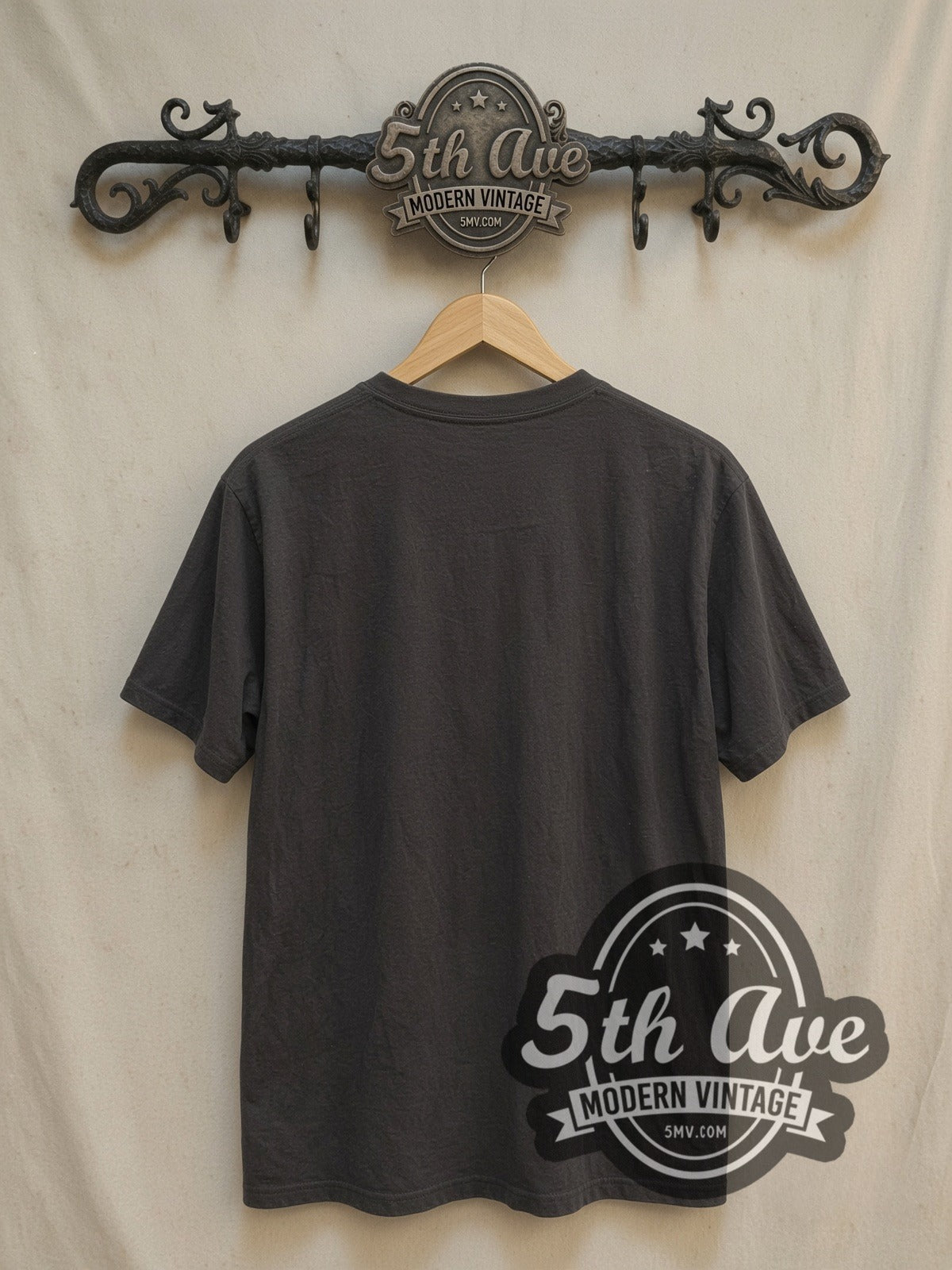 The Doors Jim Morrison Portrait vintage band t-shirt, back view on a display rack