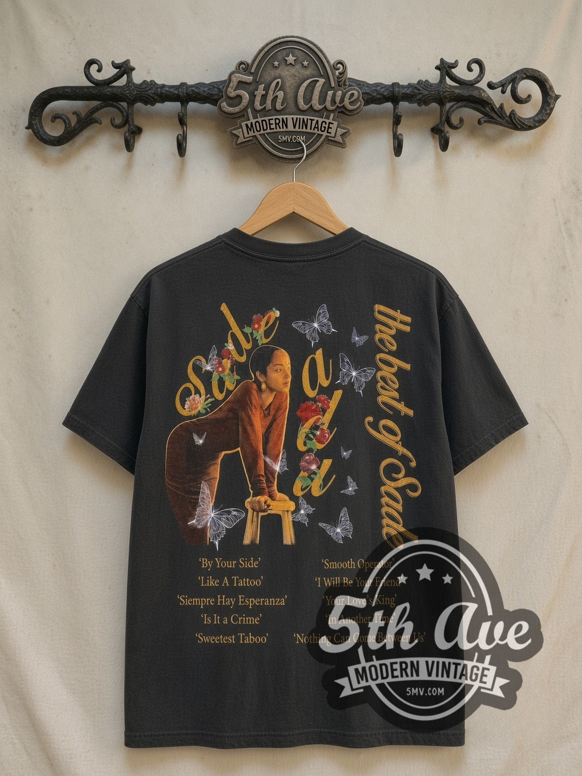 Sade The Best of Sade vintage band t-shirt in black, back view on a display rack