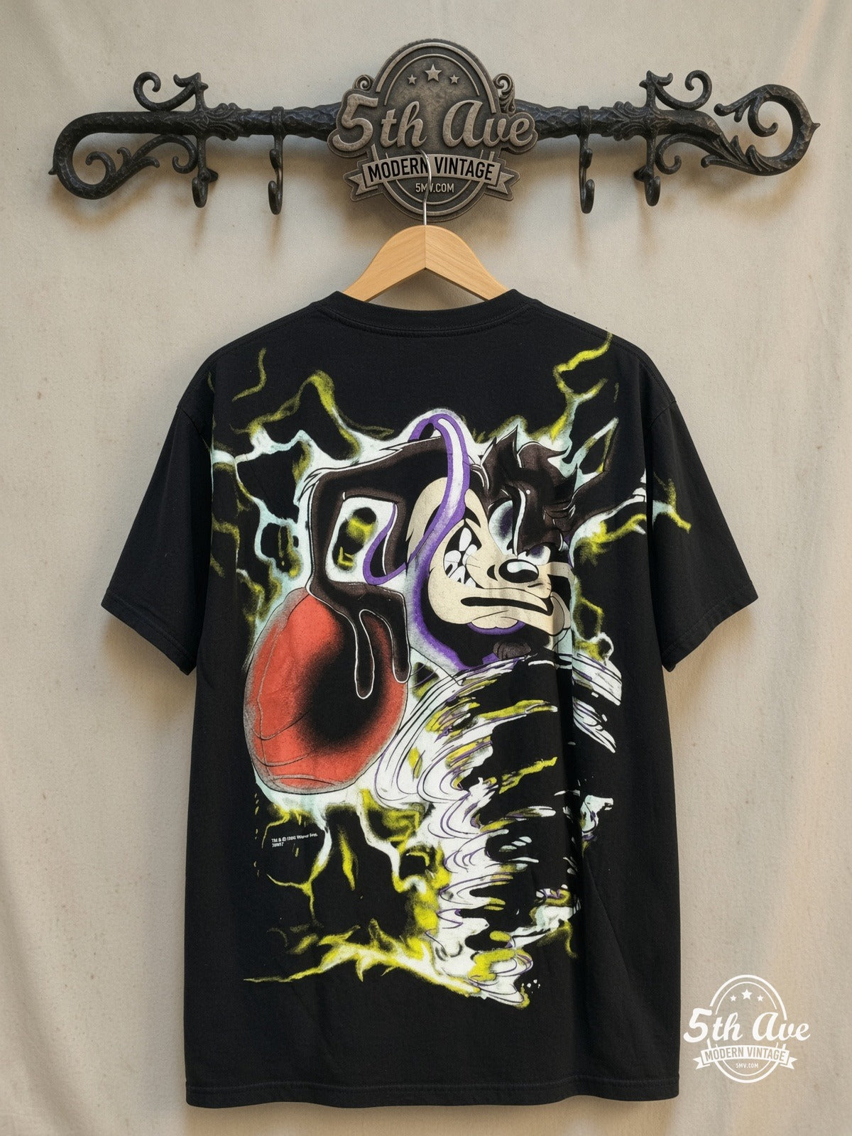 Looney Tunes – Taz-Mania Taz Tunes AOP Vintage T-Shirt – New Vintage Graphic Tee — back on locked cream ornate 5th Ave rack