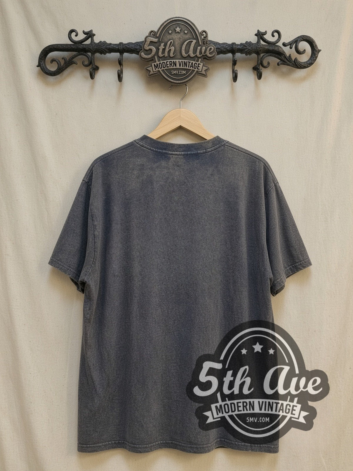 Nirvana Aqua Logo High-Contrast Trio vintage band t-shirt, back view on the 5MV rack