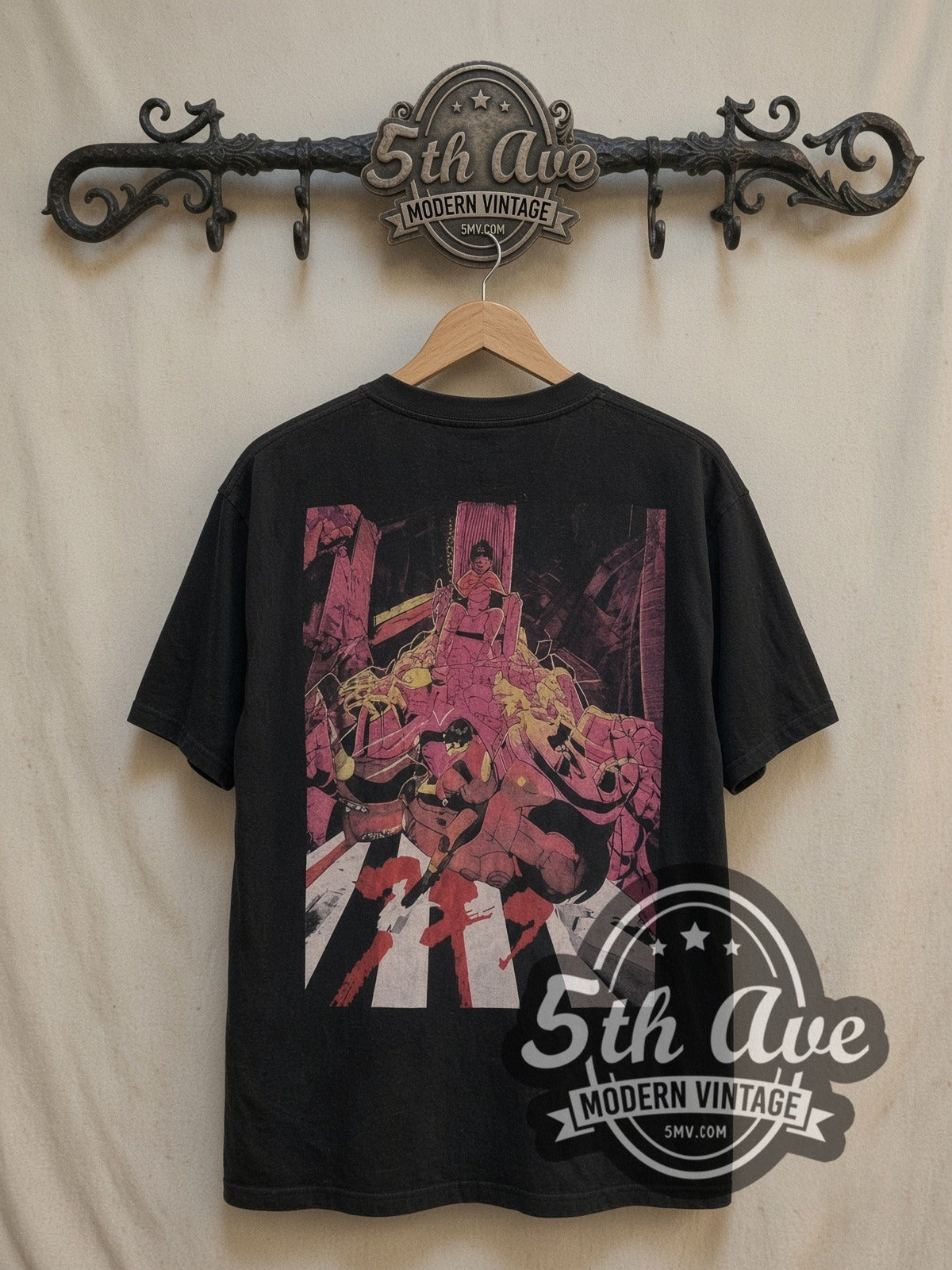 Akira all-over-print vintage anime tee, back view on a display rack
