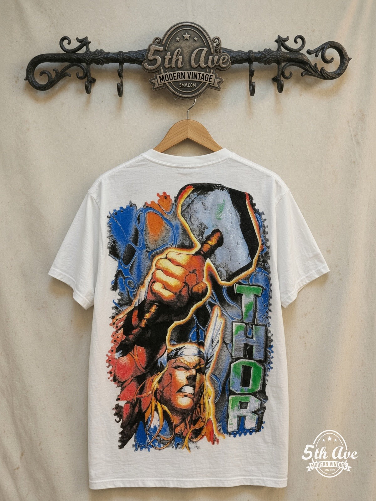 Marvel – Thor Odinson Mjolnir Comic White All Over Print – Vintage Graphic Tee — back on locked cream ornate 5th Ave rack
