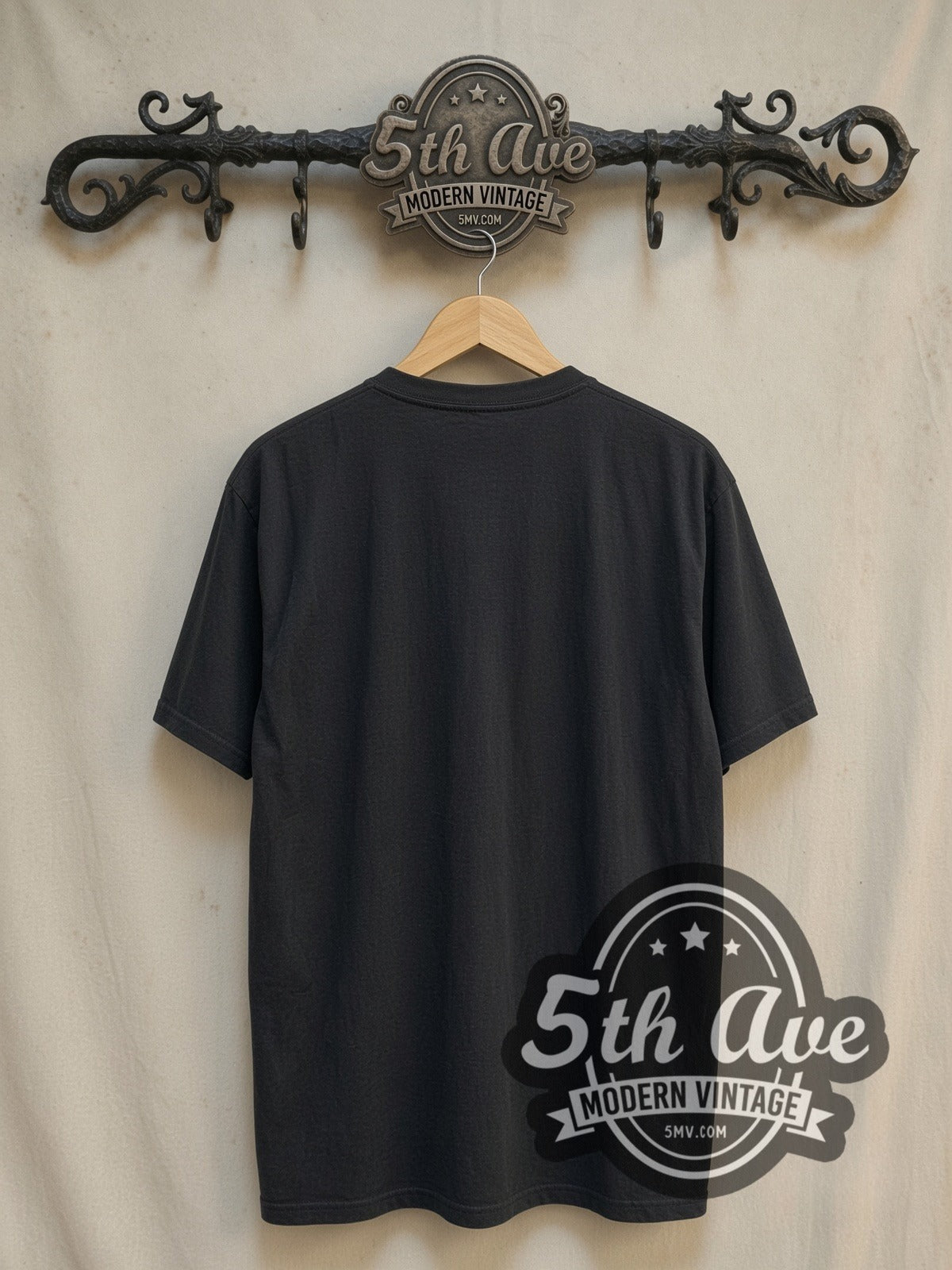 Metallica Birth School Twin Skulls Snake Banner vintage band t-shirt, back view on a display rack