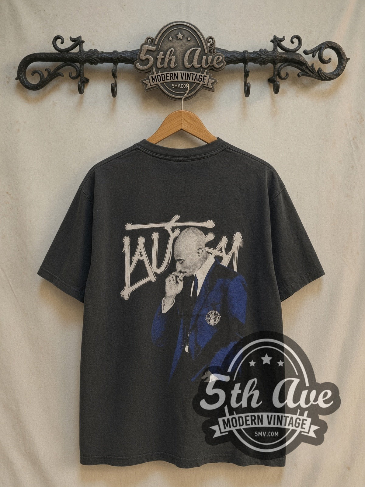 Tupac × Stüssy Only God Can Judge Me vintage band t-shirt, back view on a display rack