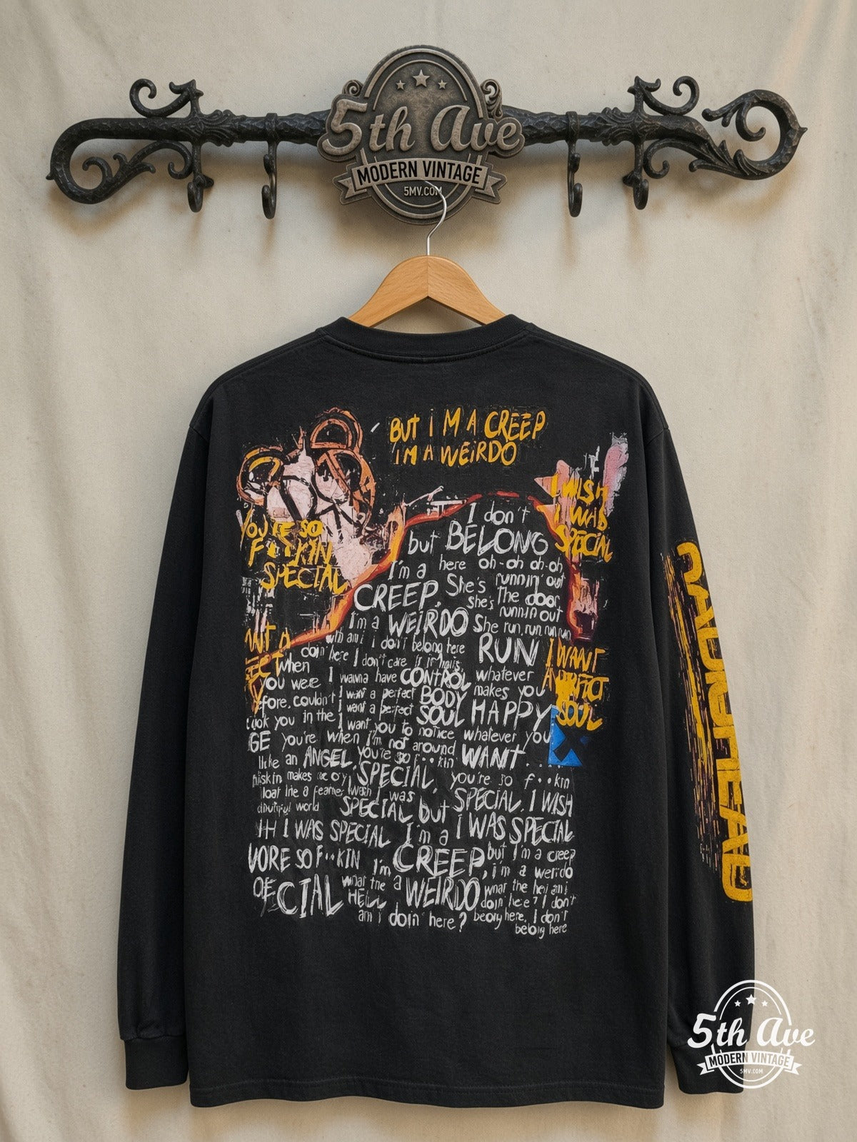 Radiohead – Pablo Honey Creep – Vintage Band T-Shirt — back on locked cream ornate 5th Ave rack