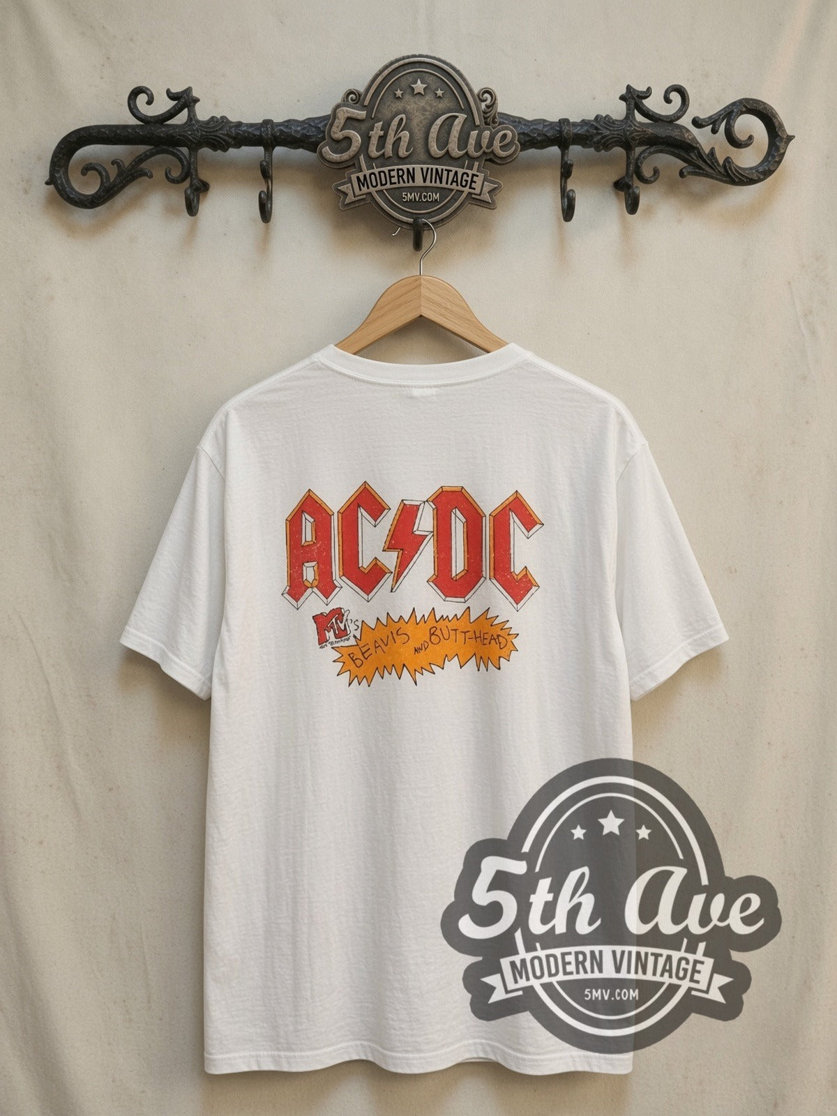 AC/DC / Beavis and Butt-Head Cartoon Crossover vintage cartoon tee, back view on a display rack