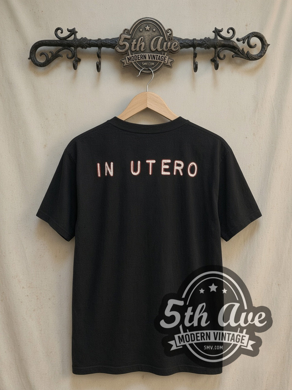 Nirvana In Utero Angel with Back Print vintage band t-shirt, back view on a display rack