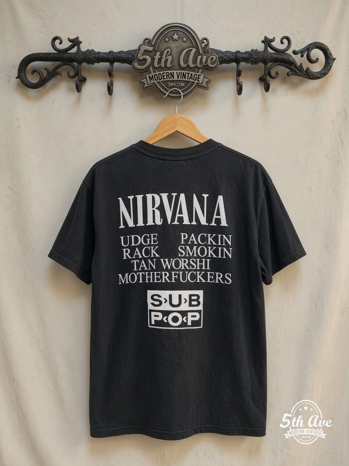 Nirvana – Circles of Hell Sub Pop Back Print – Vintage Band T-Shirt — back on locked cream ornate 5th Ave rack