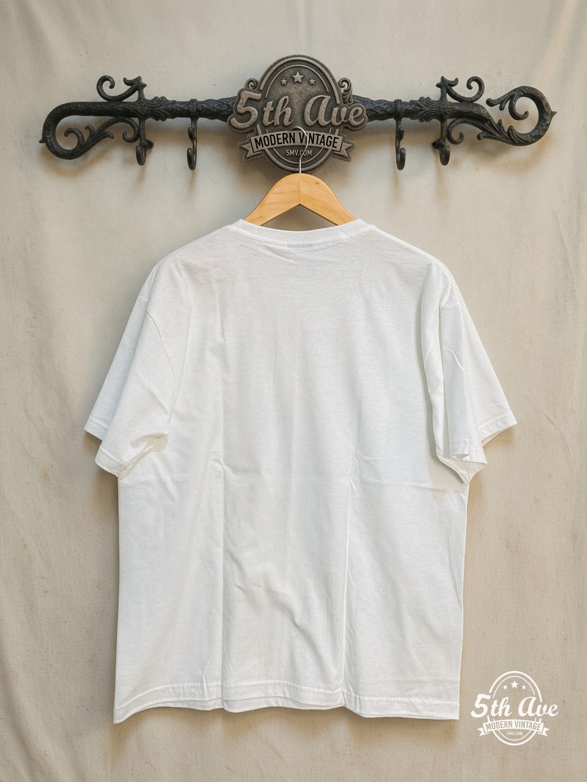 The Beatles – Cigarettes – Vintage Band T-Shirt — back on locked cream ornate 5th Ave rack