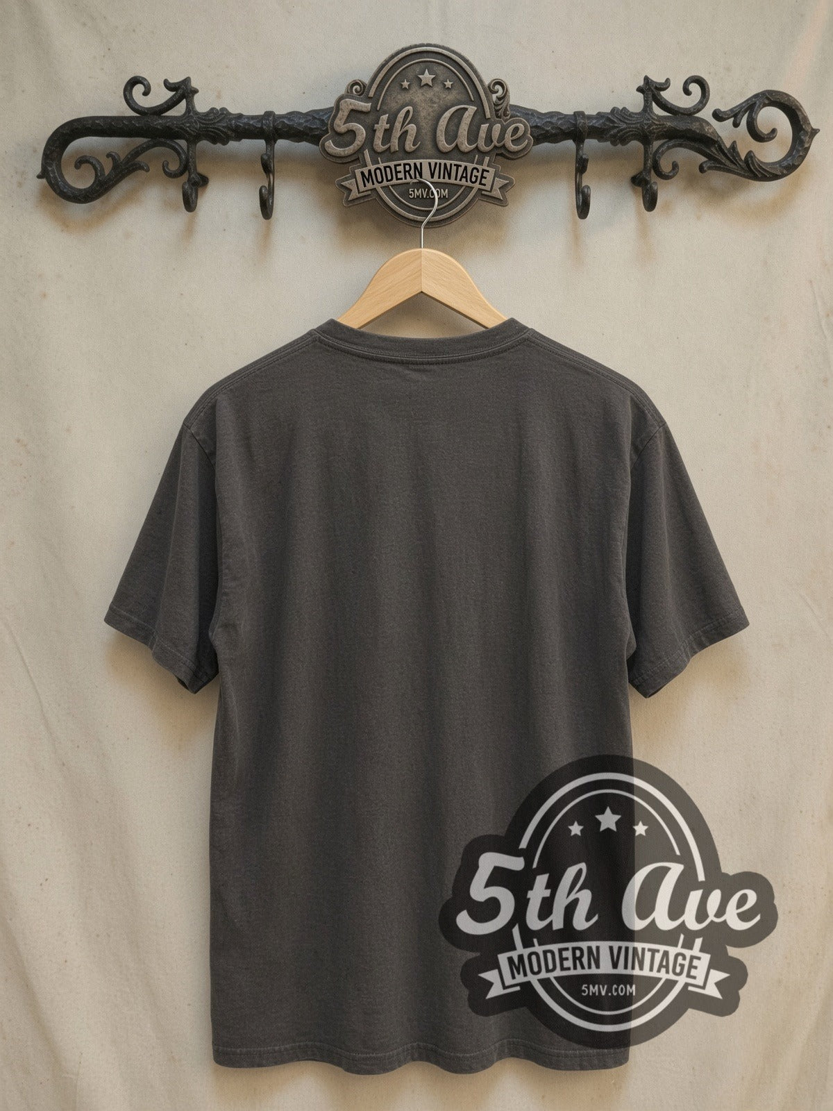 The Smiths Alleyway Band Photo Red Logo vintage band t-shirt, back view on a display rack