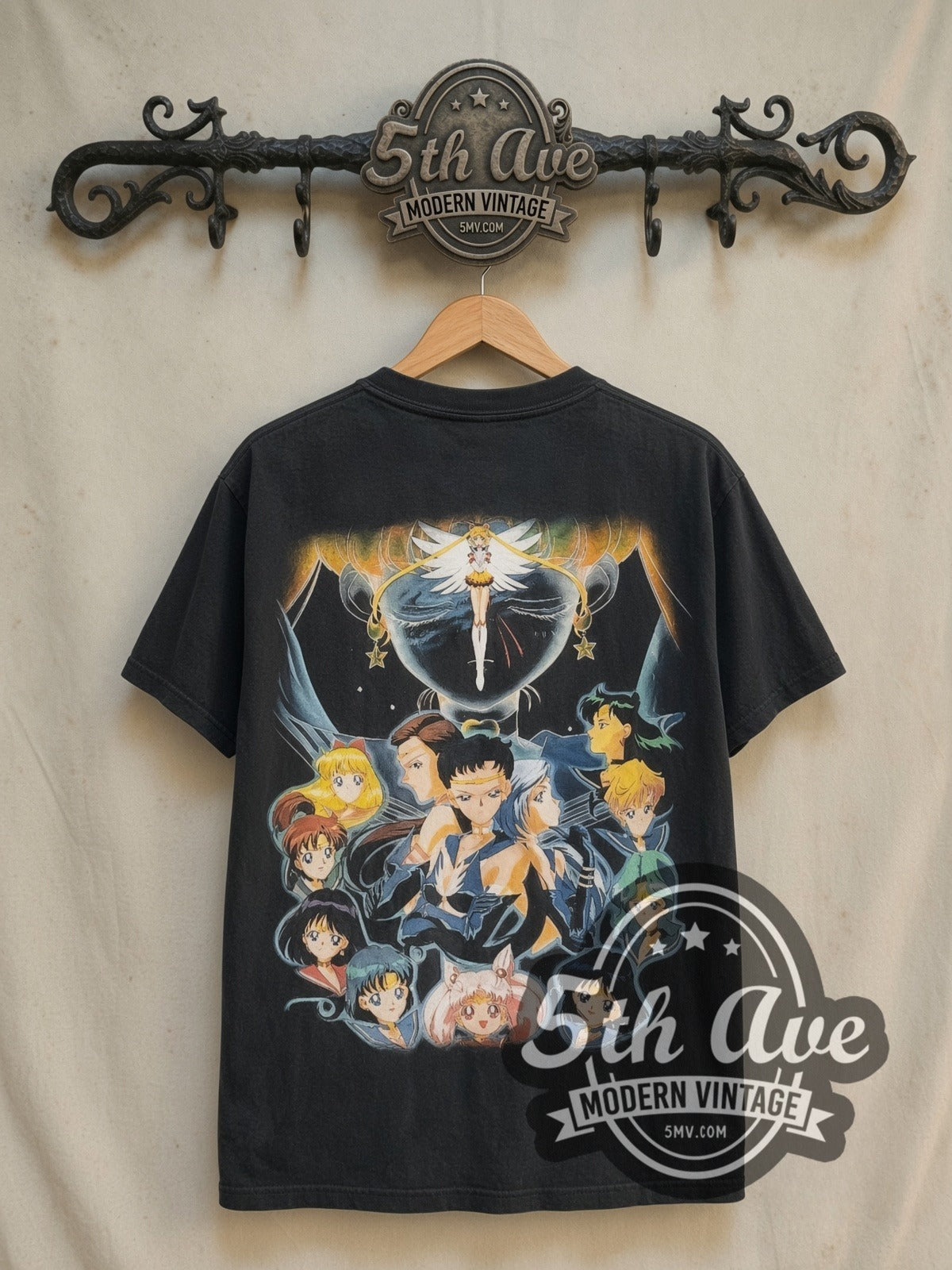 Sailor Moon Sailor Guardians and Starlights vintage graphic t-shirt, back view on a display rack